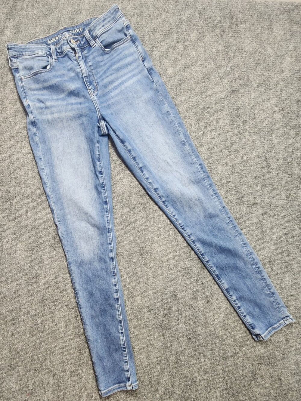 AE Super High Rise Jeggings 10L Next Level Stretch Light Wash Jeans
